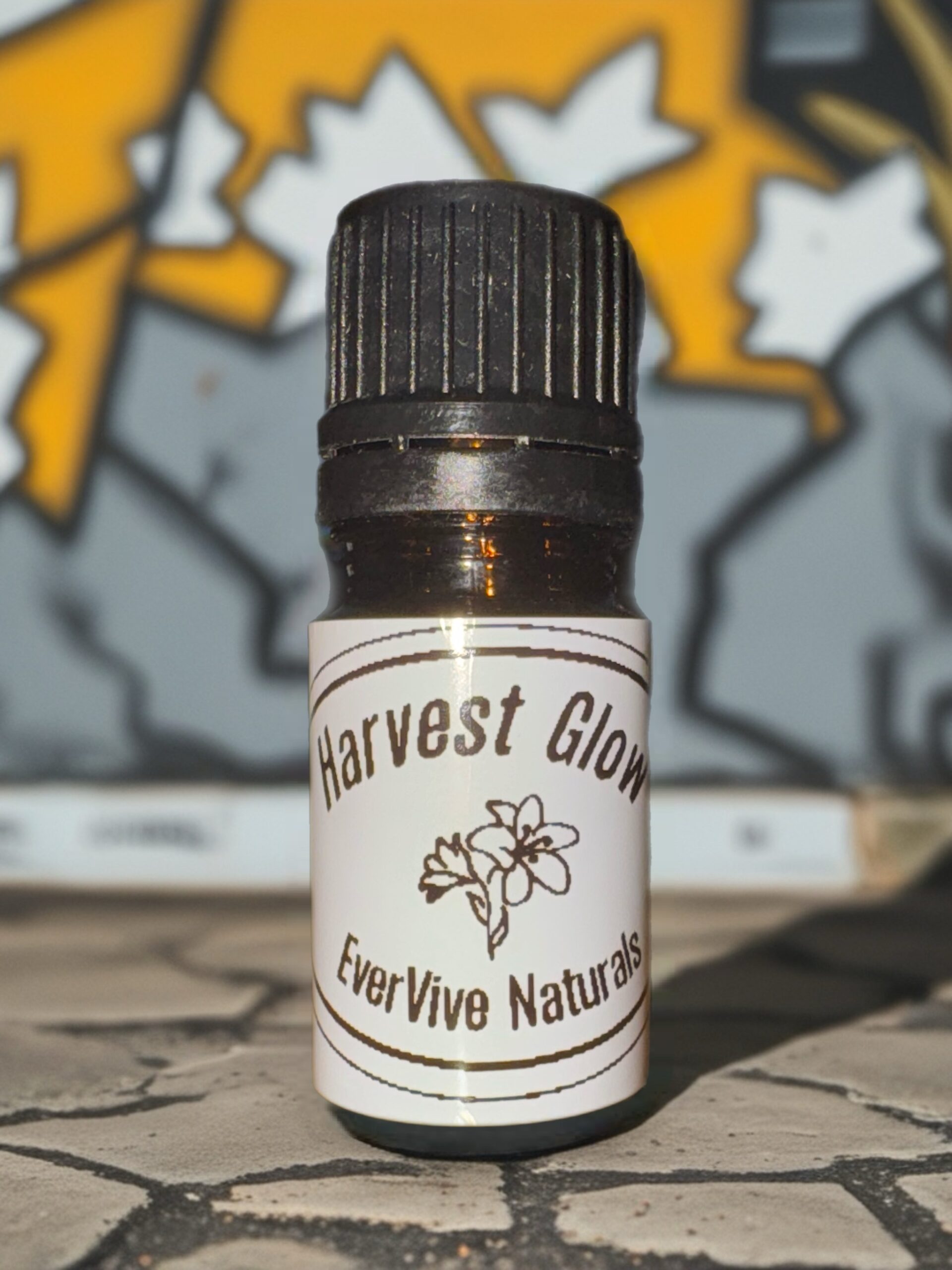 Harvest Glow Blend – autumn essential oil blend with coffee, cinnamon, and citrus notes in amber bottle