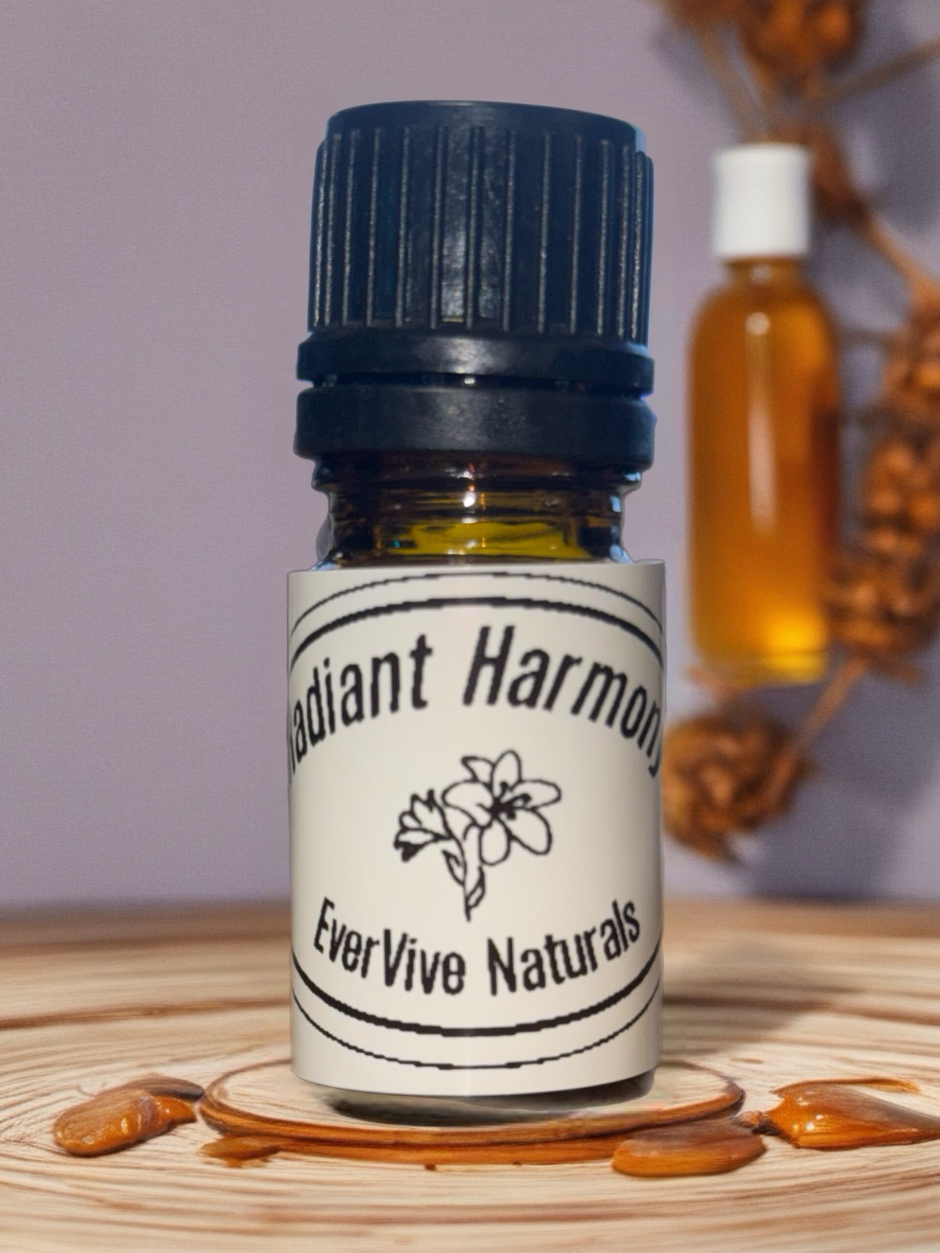 Radiant Harmony Blend – citrus and floral essential oil blend with grapefruit, geranium, and sandalwood in amber bottle on sunlit linen