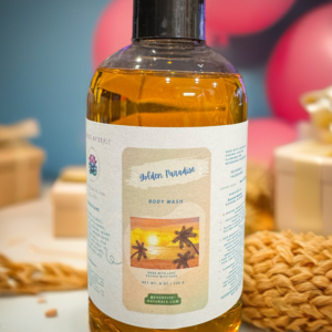 Golden Paradise Body Wash bottle with radiant golden label design